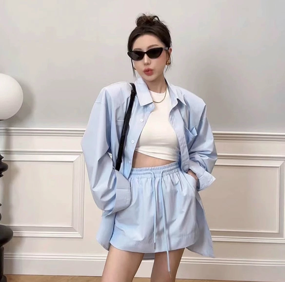 2024 early spring and autumn new Korean lazy style loose long-sleeved solid color sunscreen shirt + short skirt two-piece suit summer