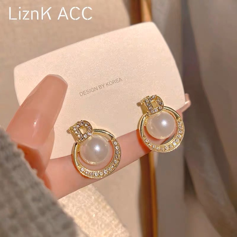 s925 silver needle unique high-end light luxury pearl earrings 2023 trendy niche design sense net red earrings ươmen