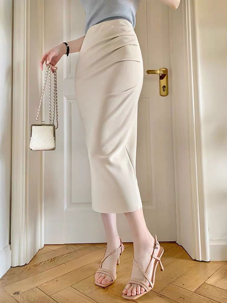 High-waisted, slimming, midi-length, hip-hugging skirt featuring a unique, stylish "Hong Kong vibe" design—perfect for a youthful yet sophisticated look.