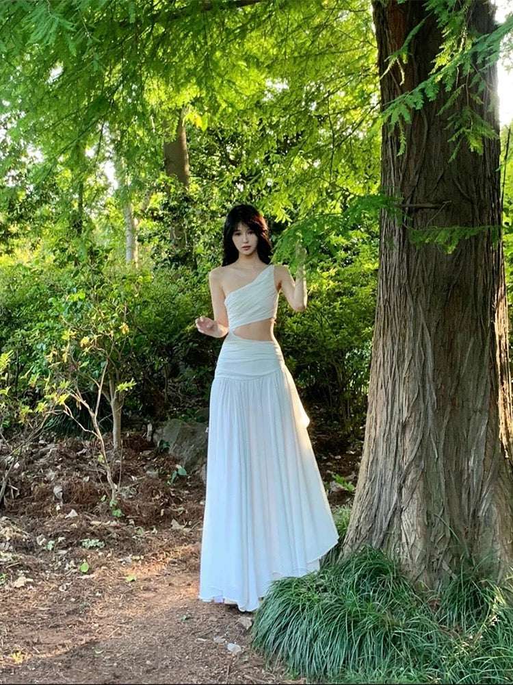 French style niche high-end cool feeling white oblique shoulder waist dress female seaside holiday atmosphere super fairy long dress