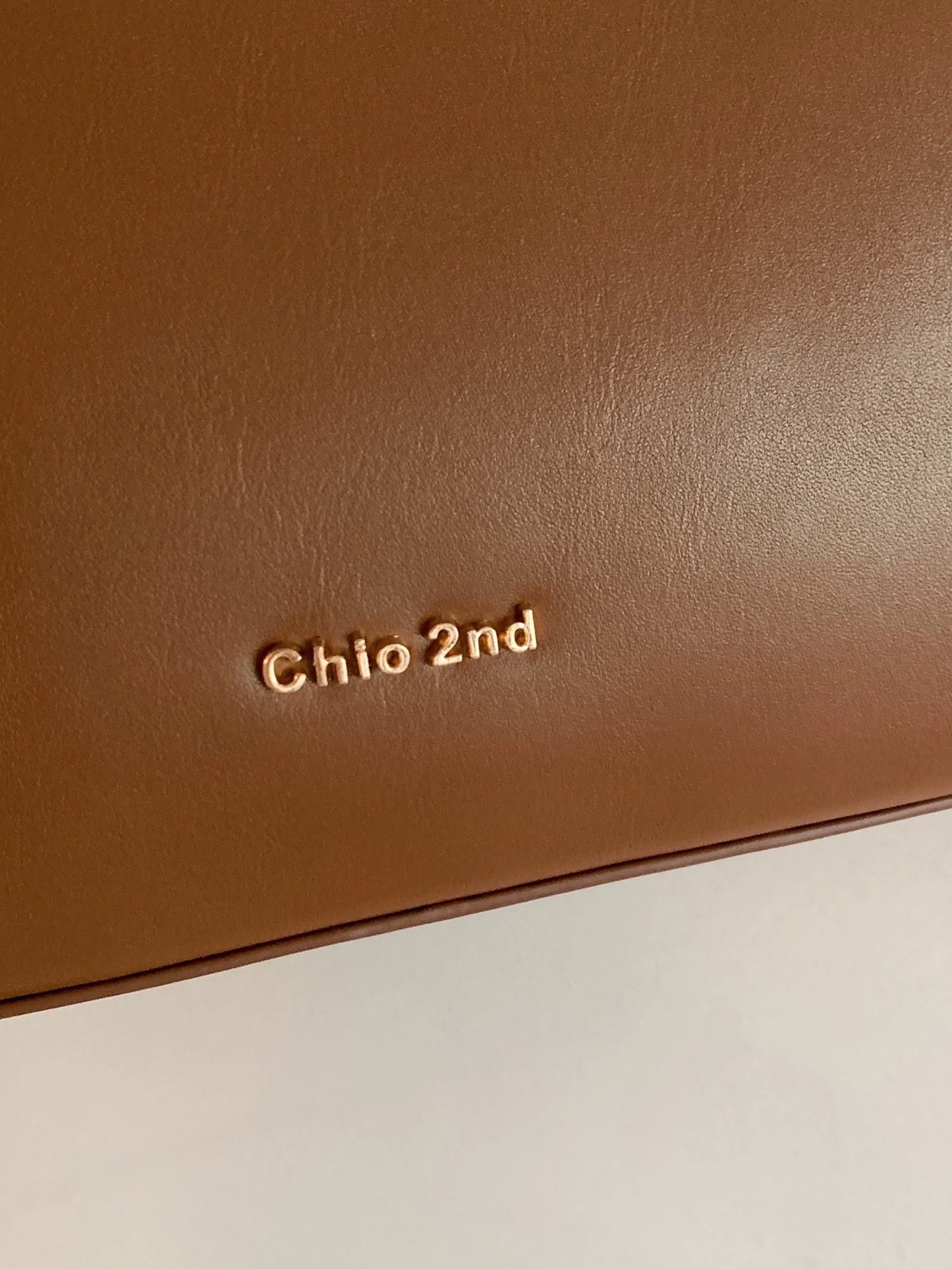 Nanfeng Chio2nd caramel milk brown shoulder bag ladies 2023 new summer messenger bag commuting armpit bag