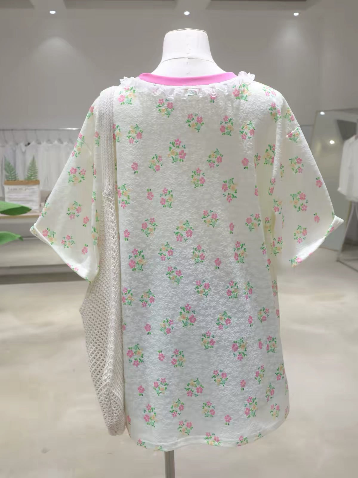 Korean-style women's short-sleeve T-shirt featuring a lace collar, floral and letter prints, and a loose, slimming, mid-length cut that covers the hips—perfect for Summer 2026.