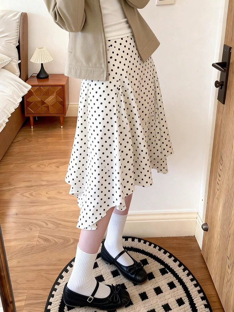 Plus-size women's retro-chic asymmetrical A-line polka dot midi skirt, high-waisted, versatile, perfect for spring and summer.