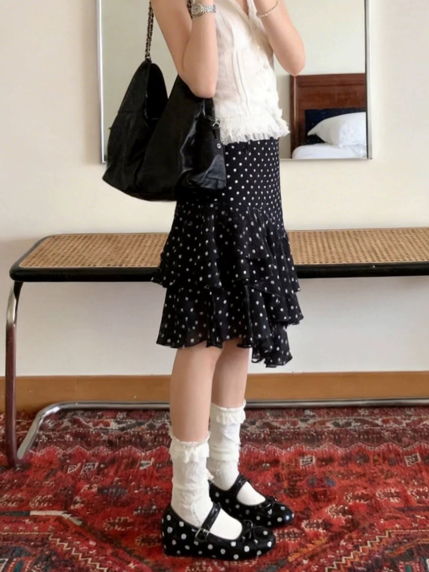 Plus-size women's black polka dot irregular midi skirt, spring/summer slimming A-line skirt, high-waisted, flattering midi skirt.