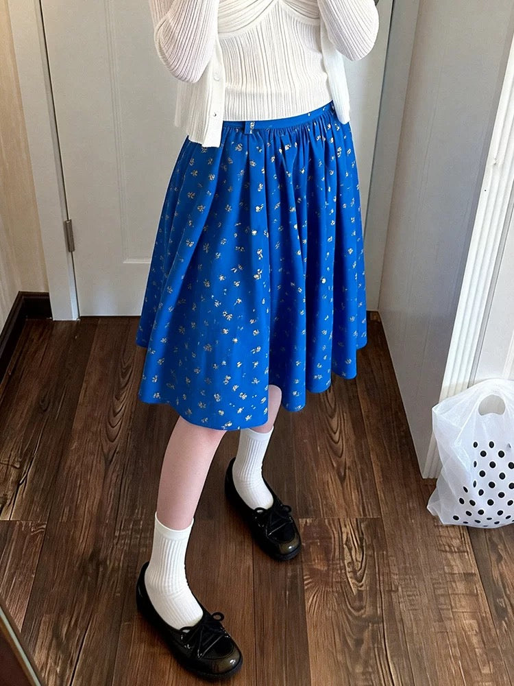 Korean style retro floral print midi skirt, new spring/summer style, high-waisted A-line, casual, unique design, flowing and versatile.