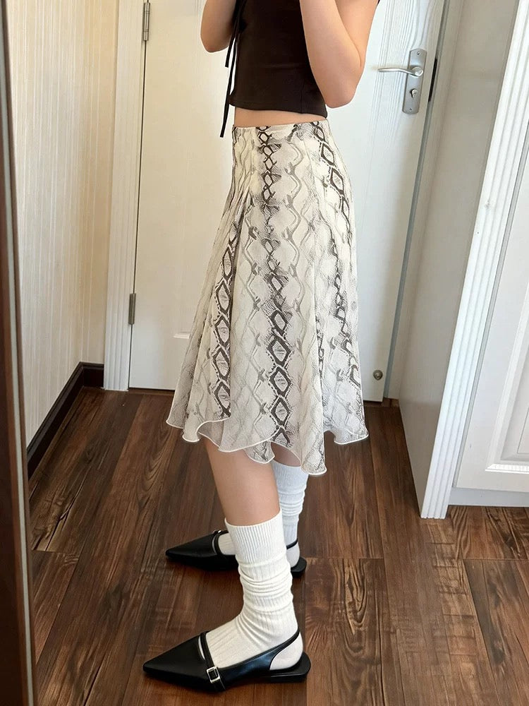 Plus-size women's snake print midi skirt, high-waisted, elegant A-line, versatile, irregular midi skirt, perfect for spring and summer.