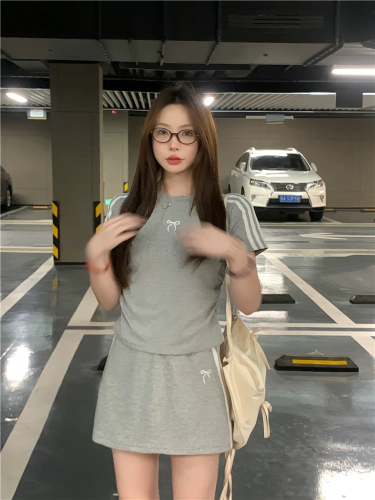 Casual sports suit for women, three-bar bow short-sleeved T-shirt, summer hip skirt, sweet girl two-piece suit