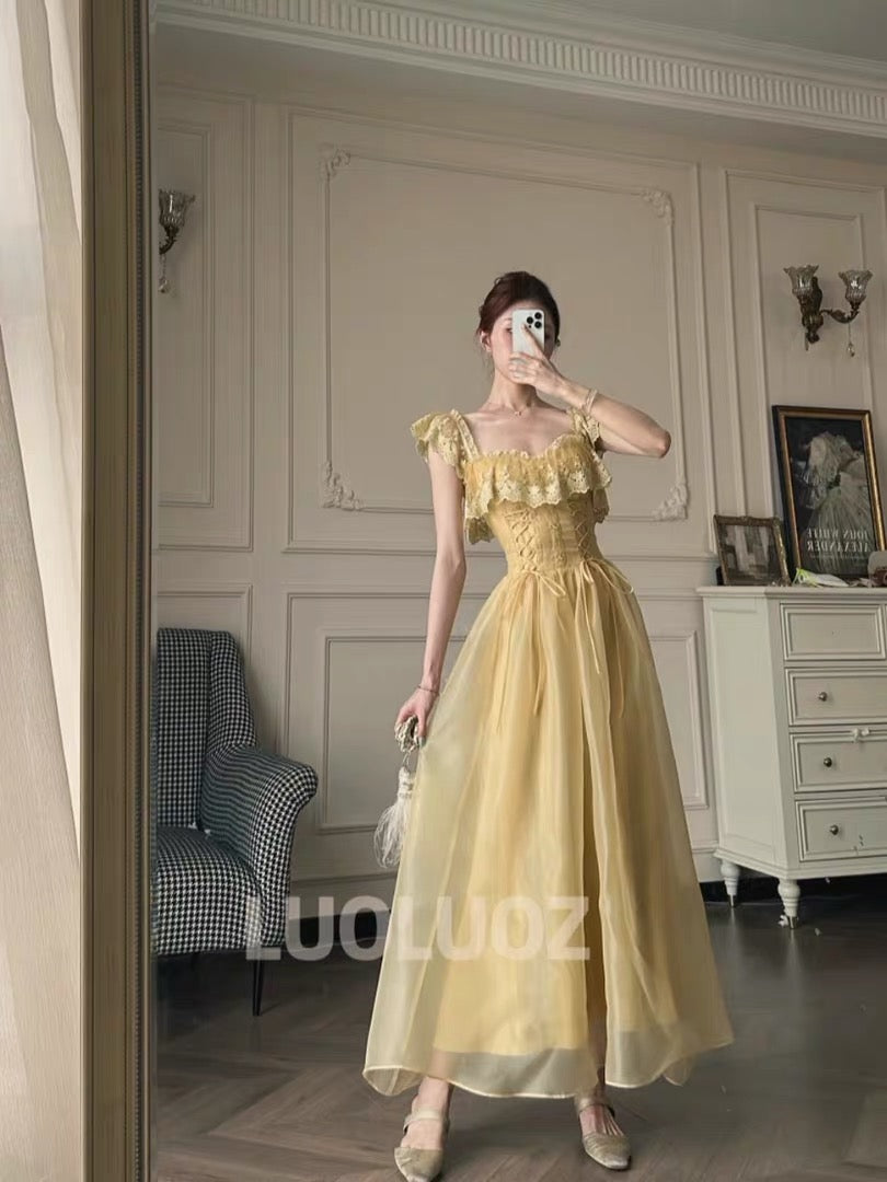 LUOLUOZ "Soft Yellow Dream" – A gentle-style long dress featuring ruffles, a fitted waist, and a wrap-style lace-up design (JF1424).
