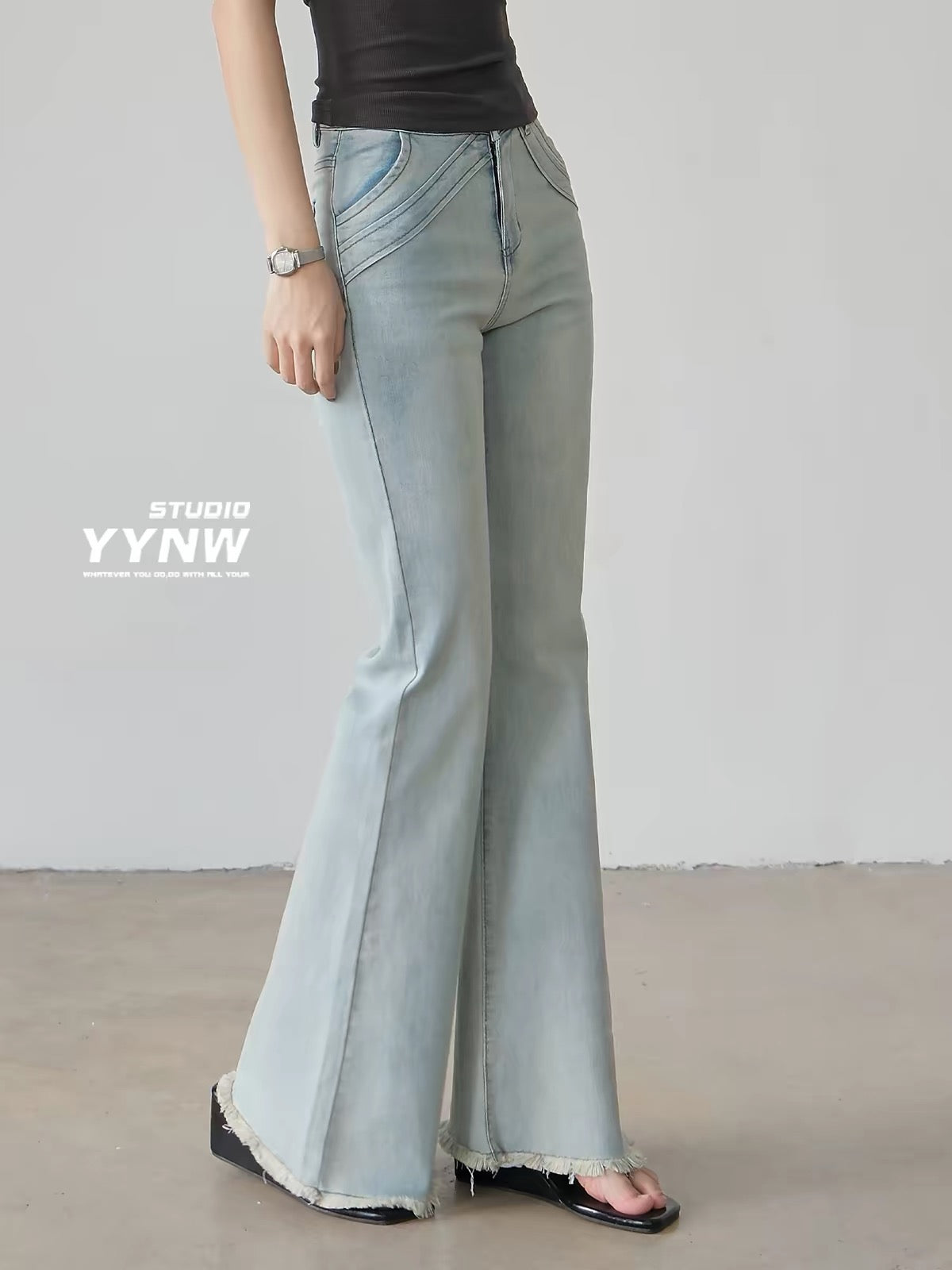 Women's American-style light blue raw-hem slight-flare jeans (2026 new summer collection): high-waisted, slim-fit, and flattering full-length bootcut style.