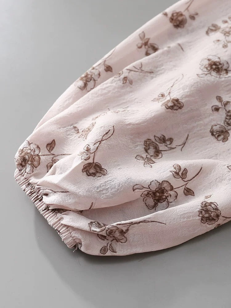 French light mature style all-match v-neck long-sleeved shirt women's 2025 single-breasted ruffled lace-up printed top