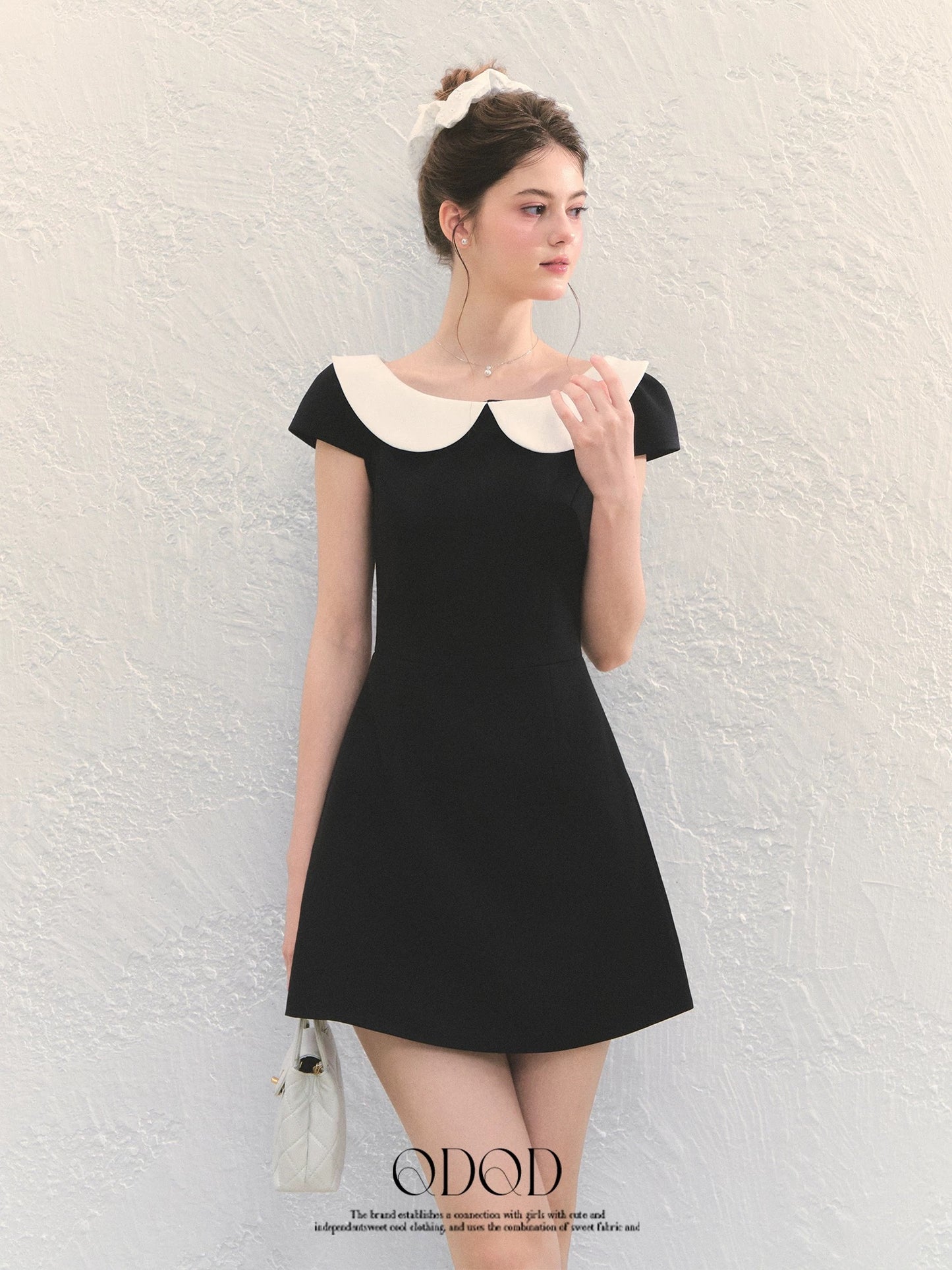 QDQD A-line dress with a Hepburn-inspired doll-face design, perfect for summer. Slimming, flattering, and with a French-inspired A-line silhouette.