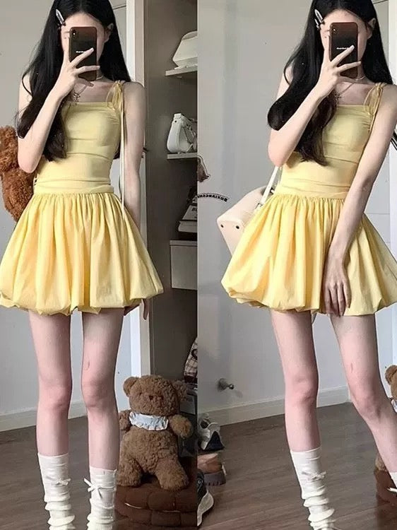 French beautiful yellow dress female sling goose yellow puffy skirt temperament bud skirt female design sense petite summer