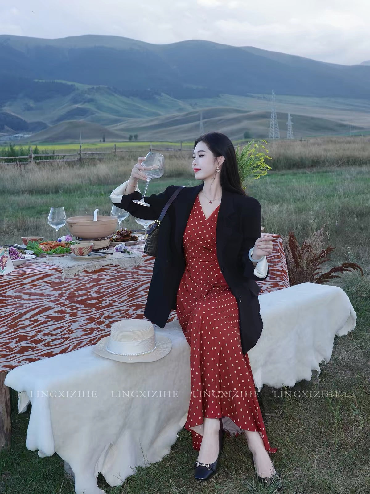Ling Qian Zi He "Woven Dreams in Vintage Red" — French-style red polka-dot wrap dress; sleeveless, fishtail maxi cut for early autumn.