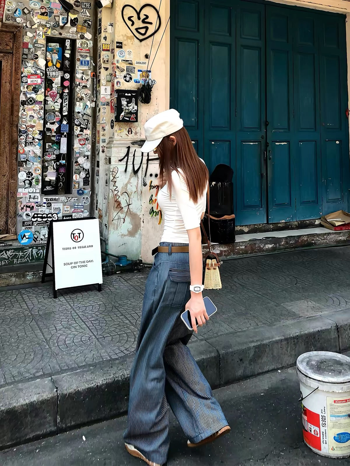 Li Wanjun "Striped Aesthetic Trousers" – A "90% Cotton" design featuring vertical stripes, a straight-leg cut, and a relaxed, slimming fit.