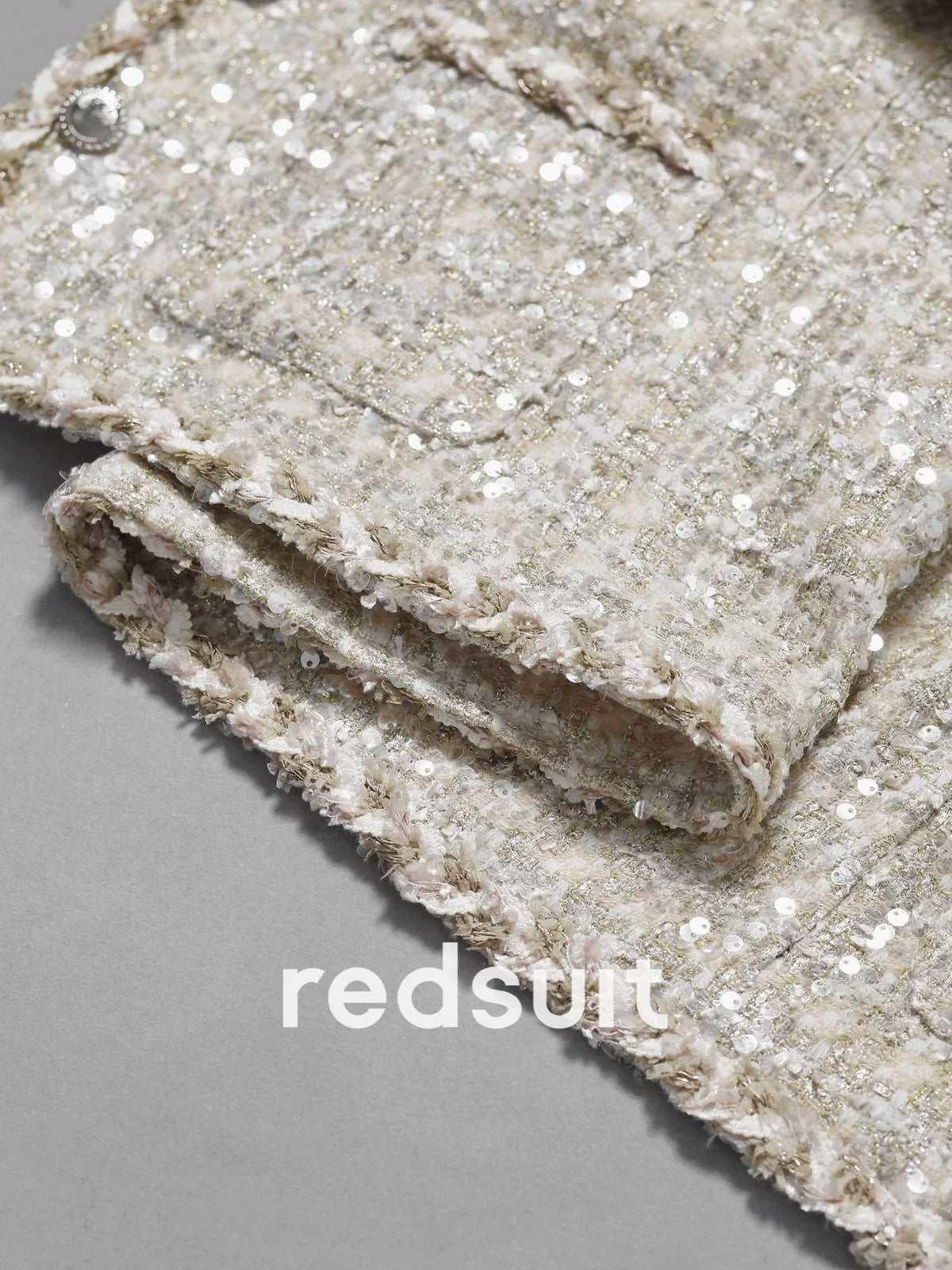 Redsuit heavy sequined heiress-style French tweed jacket with a sophisticated and unique charm.