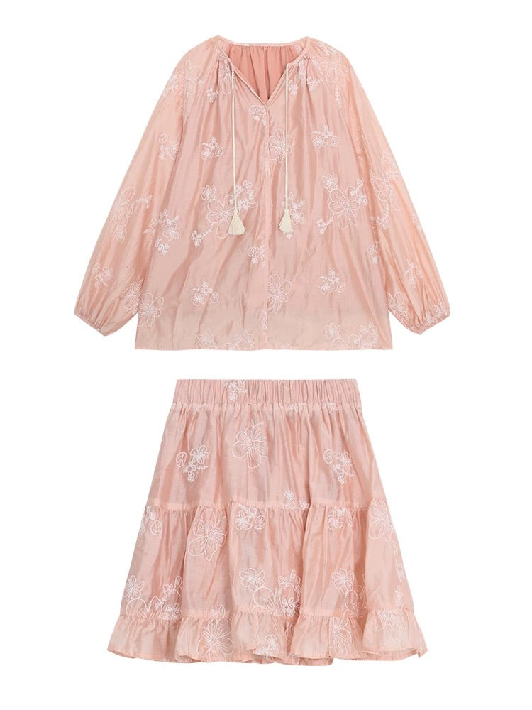Find a sophisticated two-piece set for women, featuring a sheer, shimmering shirt and skirt in a modern Chinese style, perfect for spring.