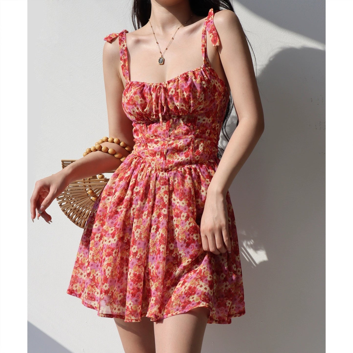 European and American retro pastoral style lace-up floral suspender dress for women with slim waist and wide swing resort style A-line skirt