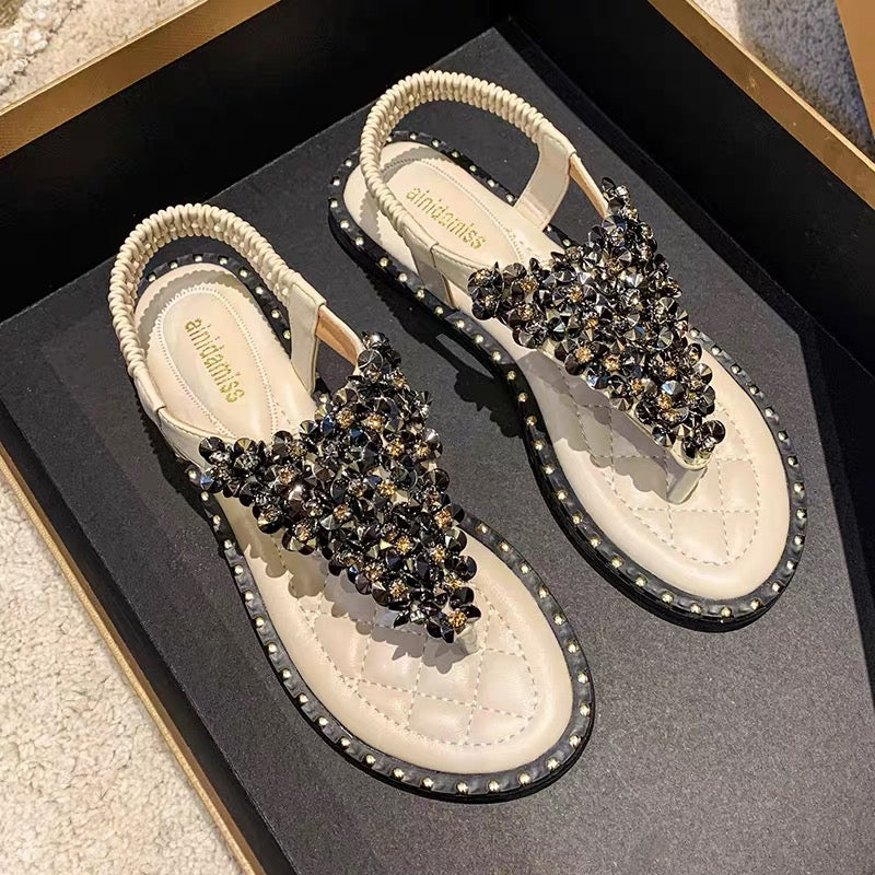 Genuine leather toe-ring sandals with a chic French style — lightweight, feminine, and perfect for summer.