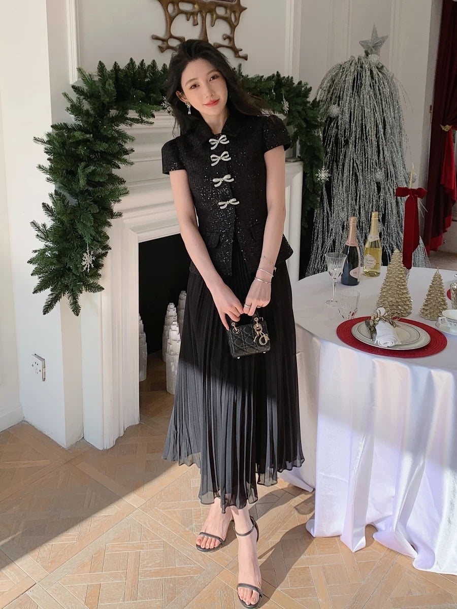 2025 new women's clothing high-end temperament commuting black woolen stitching fake two-piece dress slim long skirt