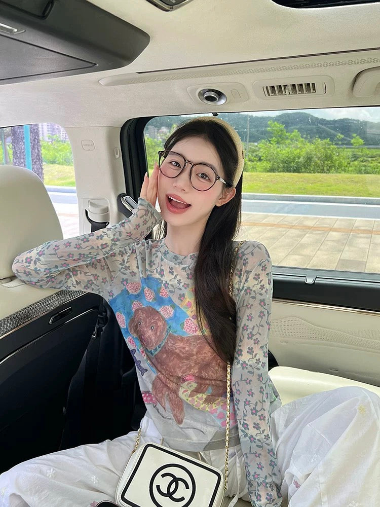 Graffiti puppy print mesh long-sleeved T-shirt for women in autumn, new design, slightly transparent, age-reducing sunscreen top