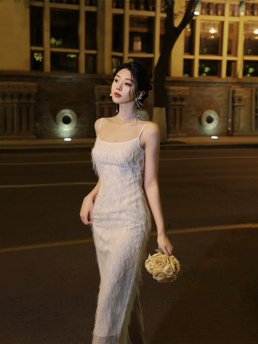Thirteen and Little French suspender dress for women, summer slim-fitting waist and back slit, elegant and high-end fringed skirt