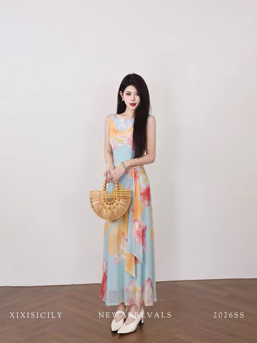 Sicily's French-style floral print summer dress with a fitted waist and belt, perfect for summer.