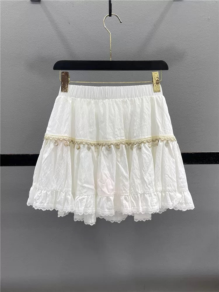 White lace cake skirt female 2025 summer design tassel slim A-line puffy skirt short skirt