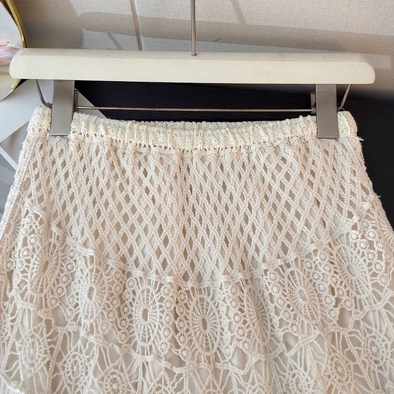 Ethnic style hollowed-out crochet lace midi skirt for women, spring 2026, elastic high waist, slimming A-line skirt.
