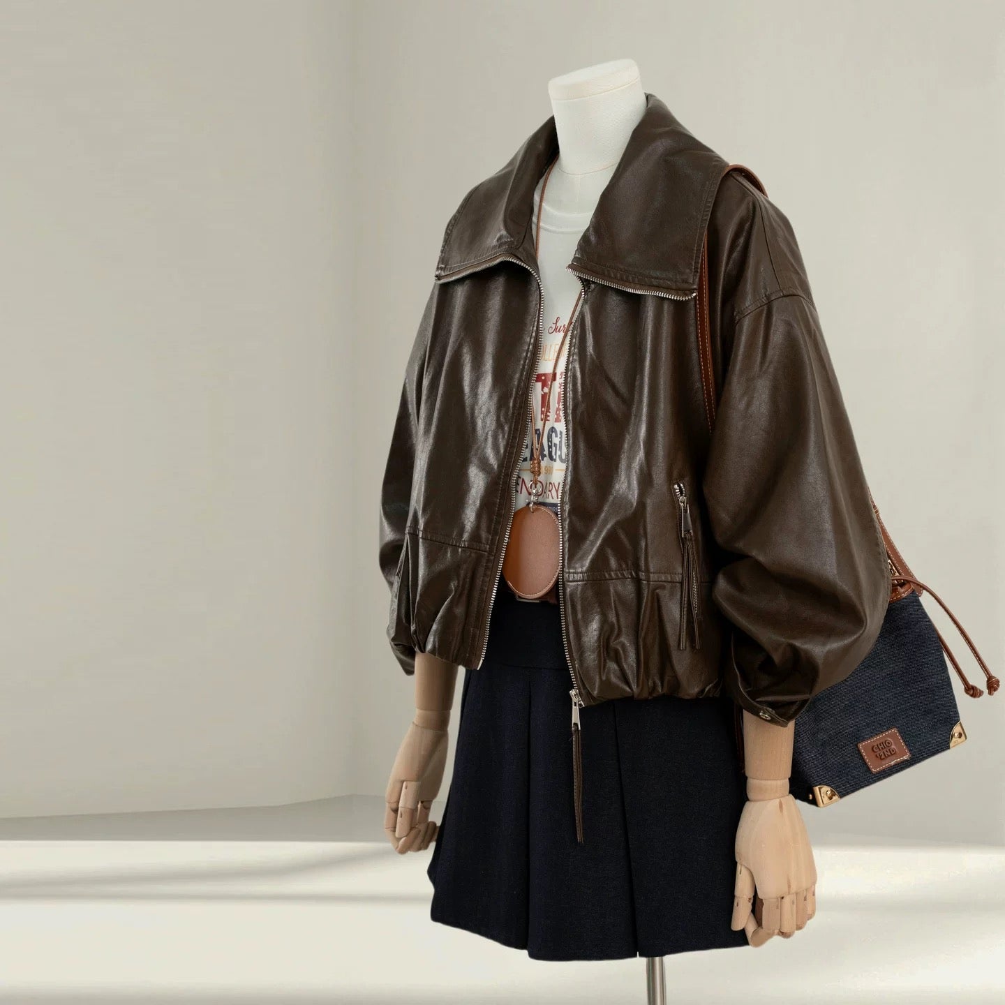 Black large lapel leather jacket women's short 2025 autumn new style popular loose slim PU leather jacket top