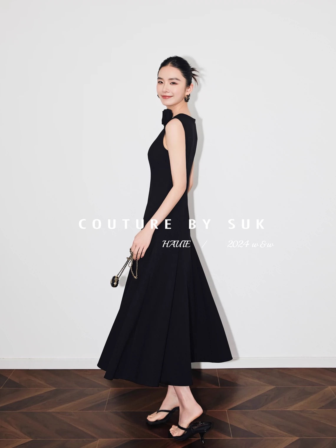 SUK elegant celebration! 2024 new white high-end temperament black sleeveless dress women's summer long style