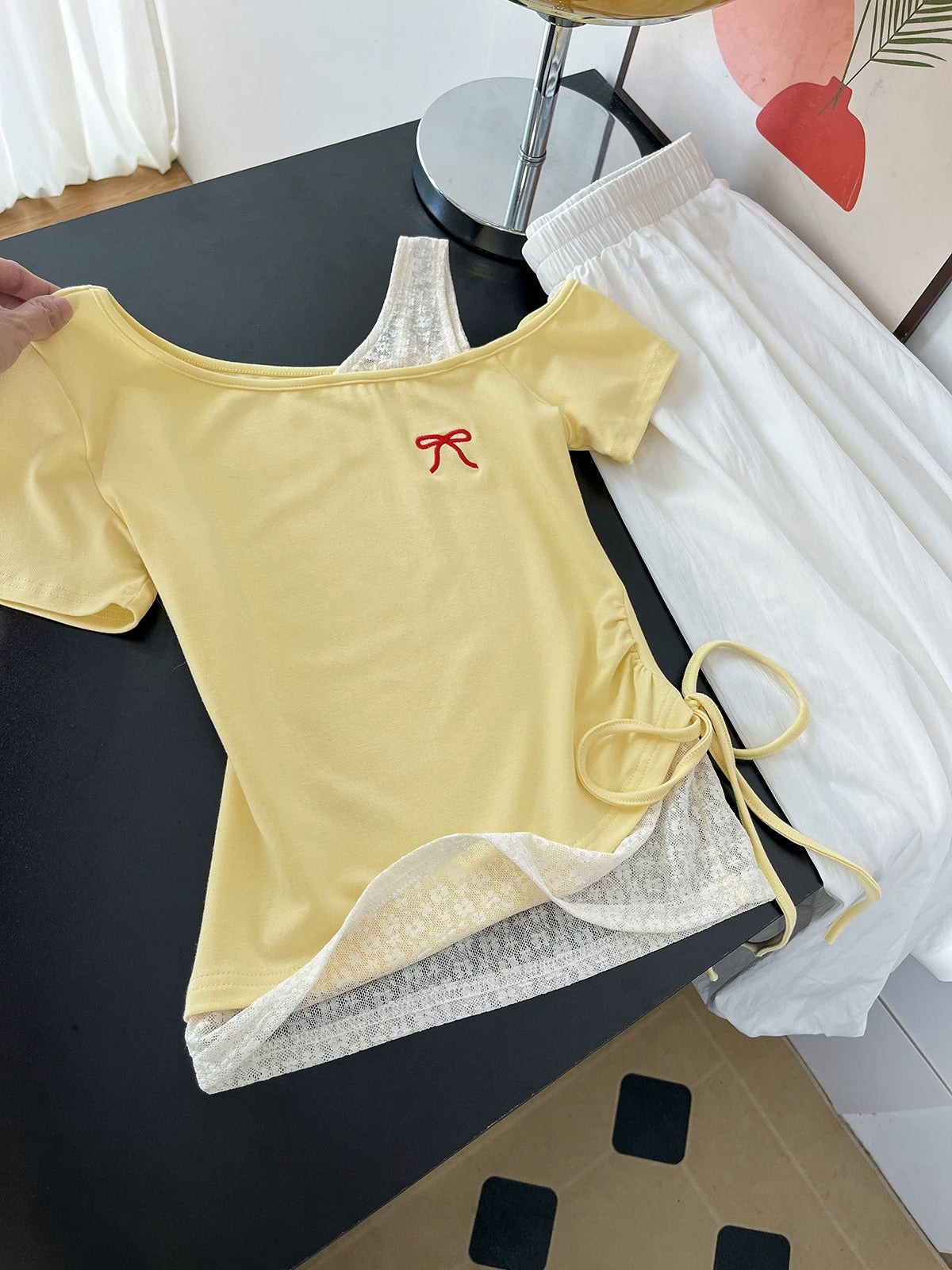 Love it at first sight~ The temperament is off the charts! Summer light yellow splicing lace short-sleeved T-shirt for women with oblique shoulders and pleated waist tops
