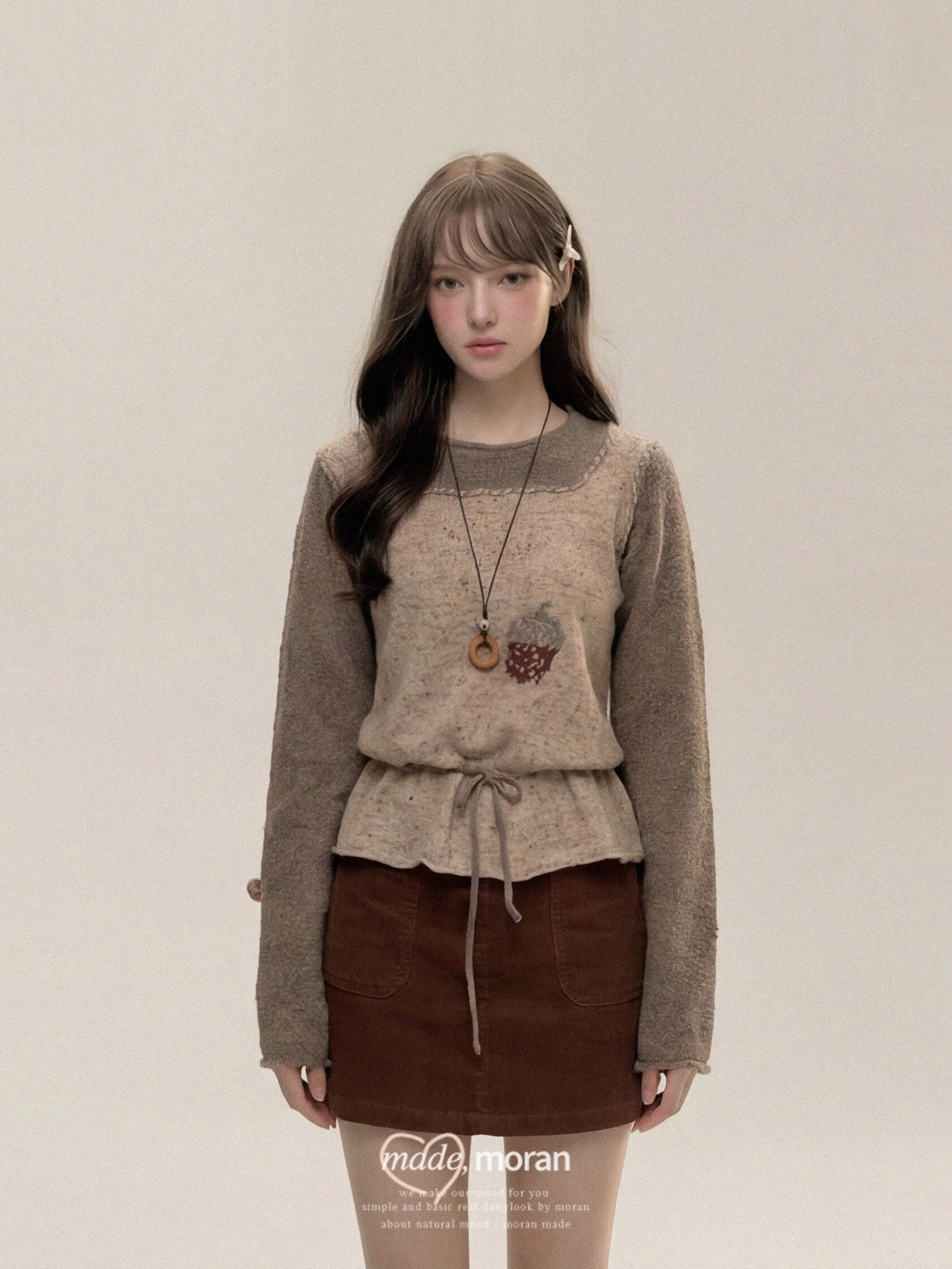 Korean-style autumn/winter outfit set: a relaxed, two-piece look with a high-waisted skirt and a top.