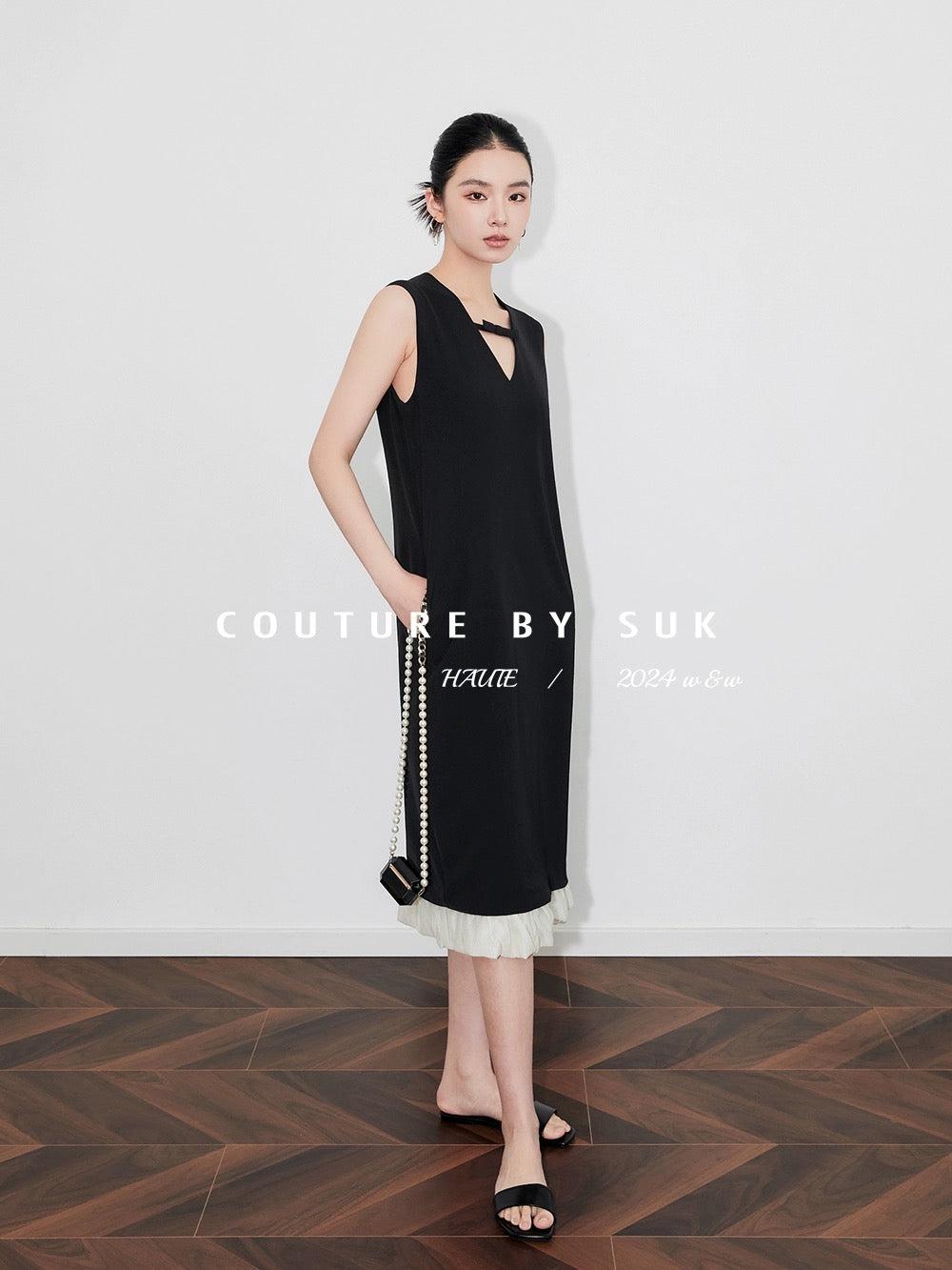 SUK to the simple little black dress! French sleeveless tie design hem patchwork little black skirt shift dress