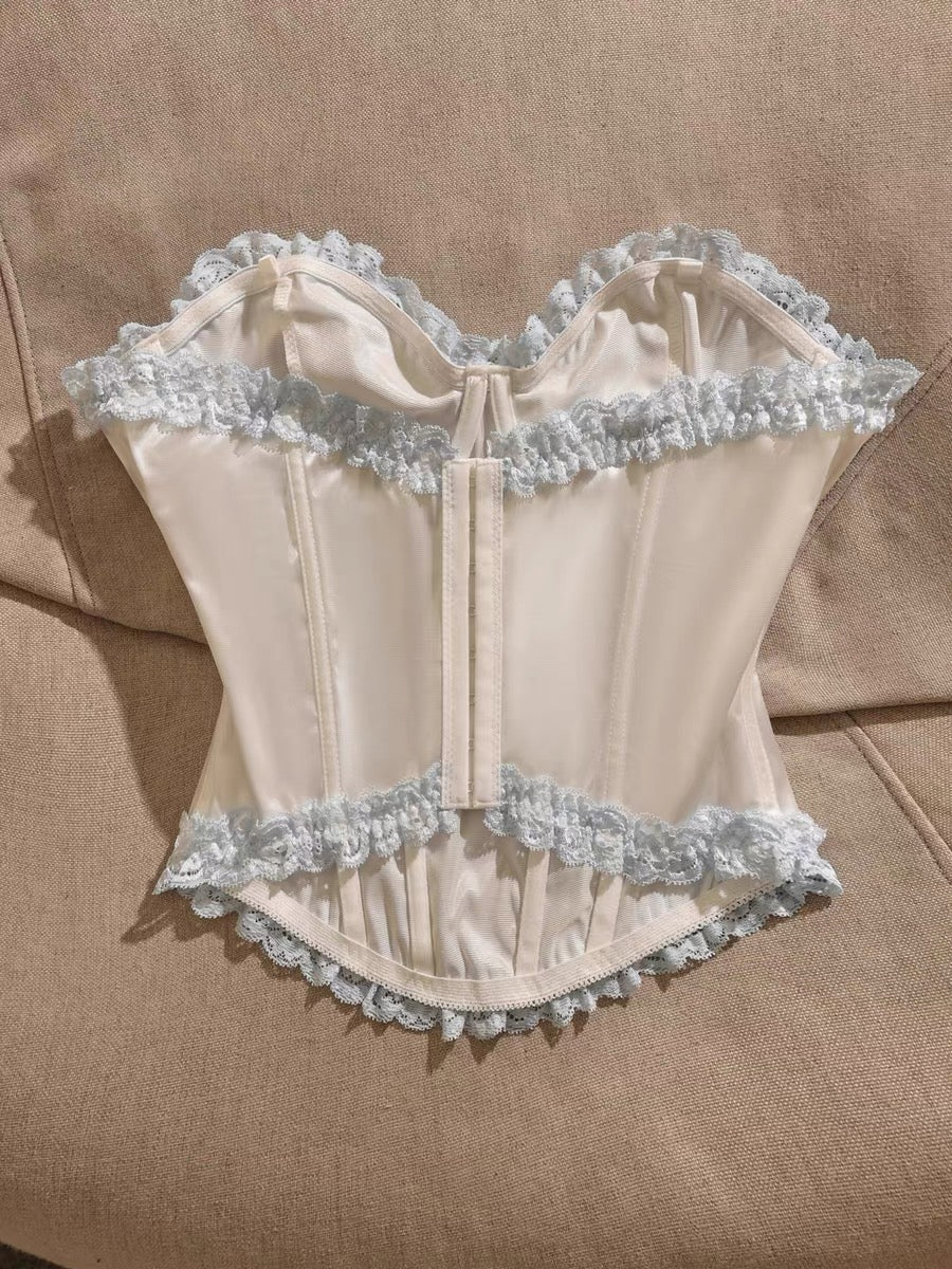 Sweet lace-trimmed, boned, off-the-shoulder corset top—perfect as a standalone piece or a stylish base layer; features a lace-up design for a slimming, waist-cinching fit.