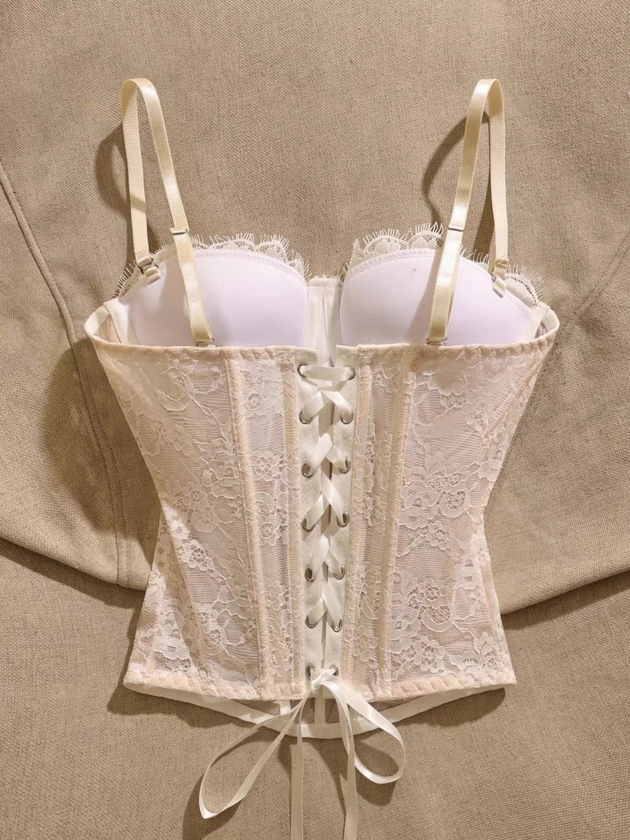 French-style lace bustier camisole with boning—a chic, sexy, and sweet top featuring a waist-cinching, slimming fit and built-in padding
