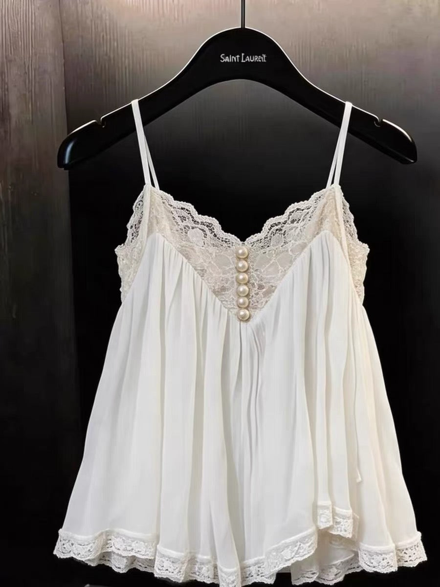 A stunning, stylish, and chic white camisole for women—perfect for summer workwear or casual outings. Featuring a flattering, slim-fit silhouette and exquisite lace paneling, this unique top blends fashion-forward design with effortless elegance.