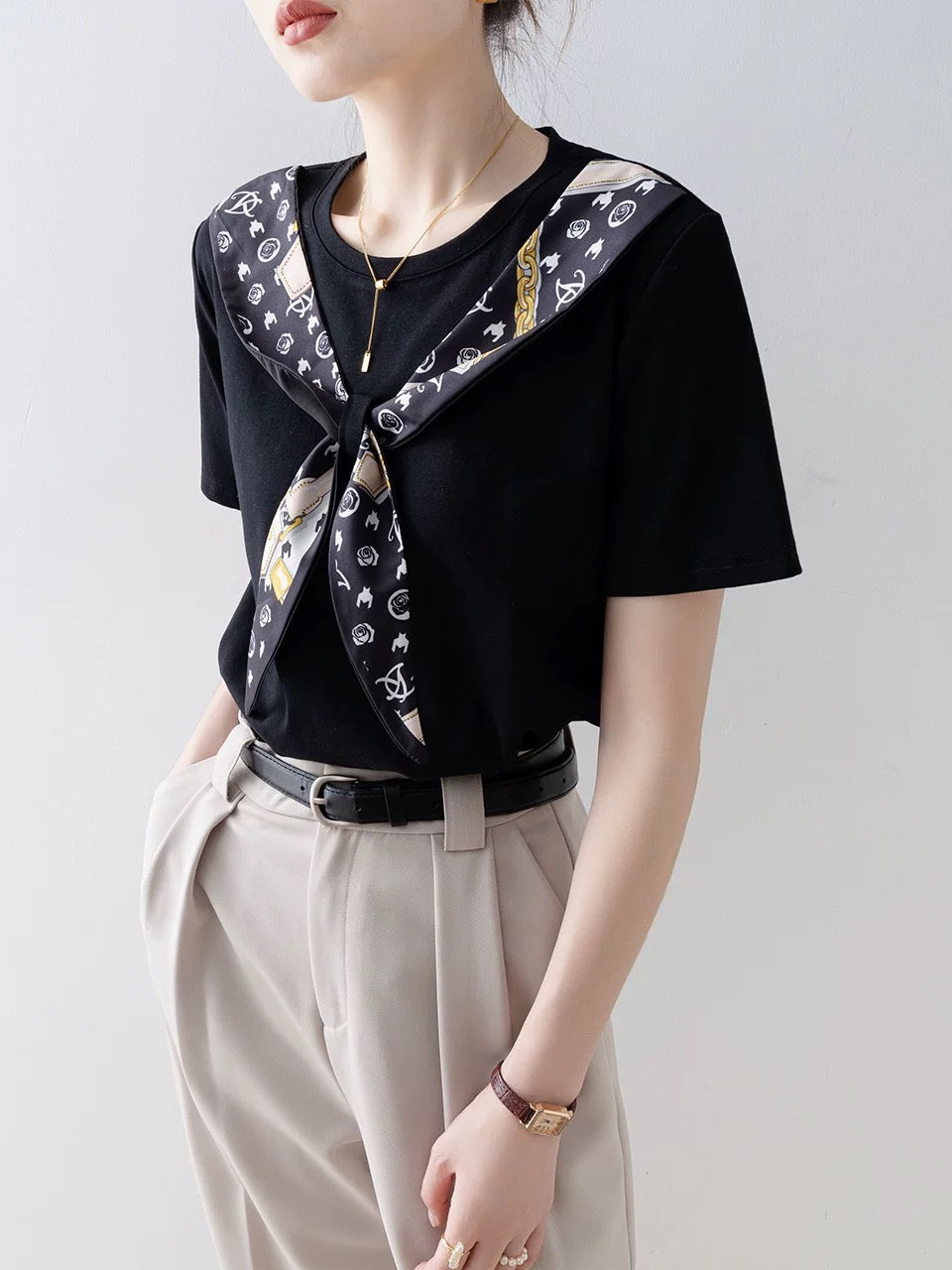 Black round neck short-sleeved T-shirt for women summer 2025 new high-end European goods fake two-piece stitching unique super good-looking top