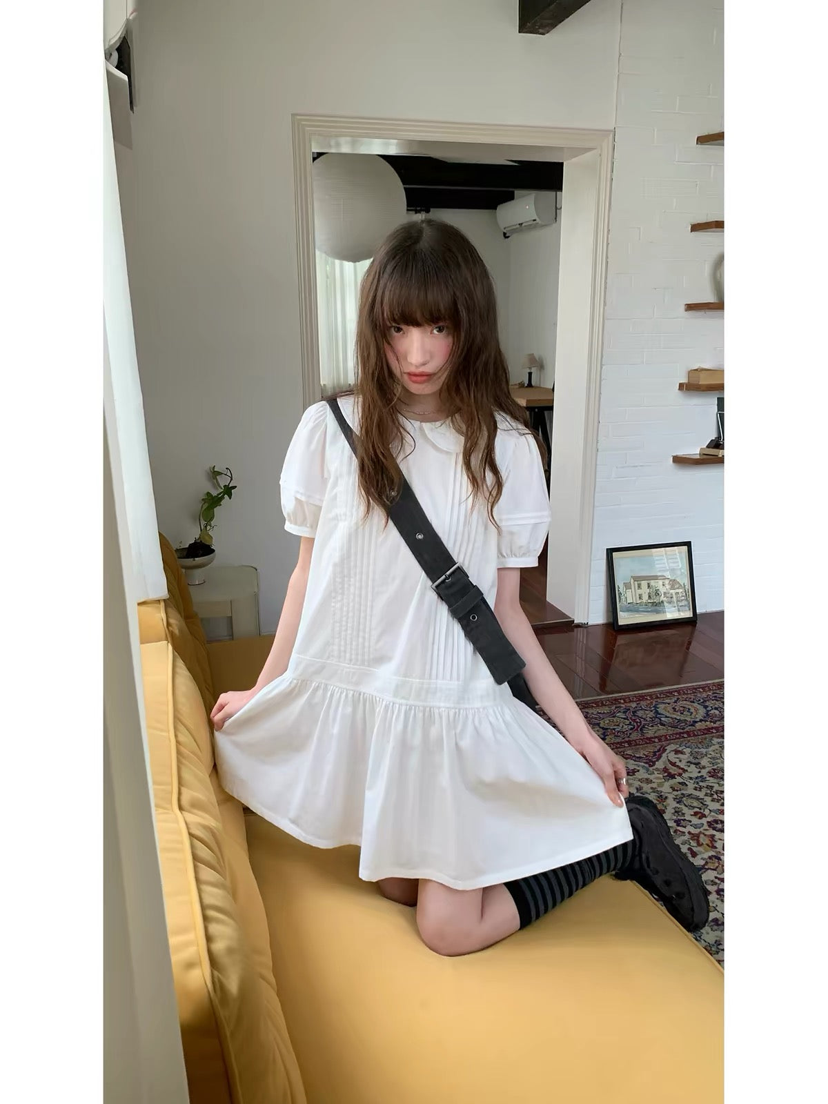 RAINY Sweet Preppy-Style Solid-Color Dress: Featuring a Peter Pan collar, puff sleeves, and a pleated panel skirt—a youthful, short-length design.