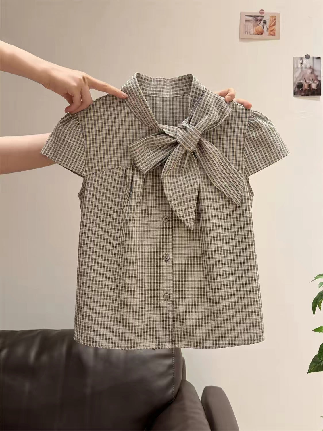Unisex retro plaid short-sleeve top featuring a mandarin collar, bow-tie detail, and flattering flutter sleeves—perfect for a chic, intellectual summer look.