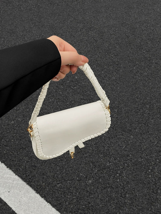 Niche hand-held white bag for women 2024 summer new fashion single shoulder crossbody bag versatile woven saddle bag