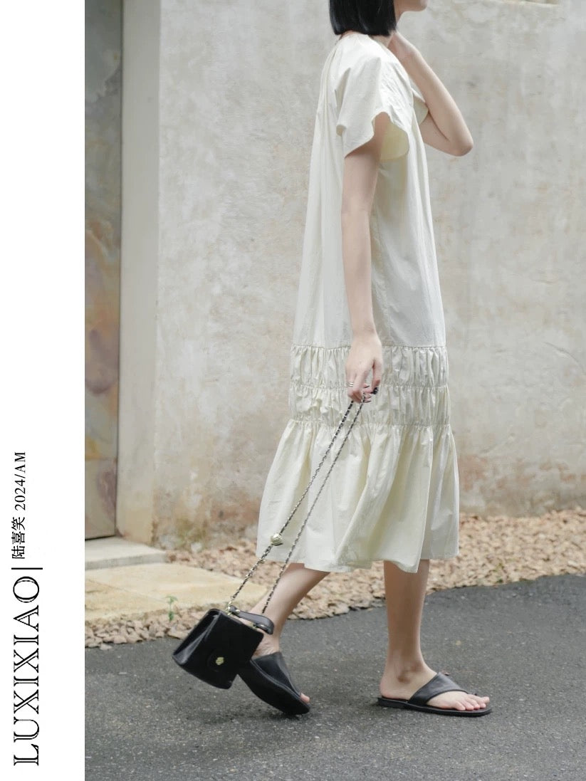 LUXIXIAO dress 2025 new loose slim round neck design pullover Korean version short-sleeved shirt dress female