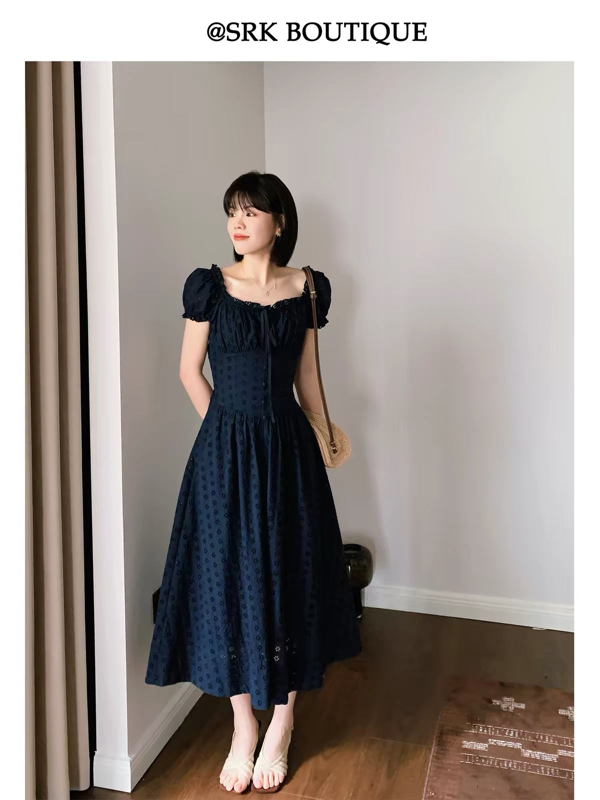 SRK French-style vintage navy blue A-line maxi dress featuring a stylish square neckline, intricate cut-out embroidery, and a flattering, voluminous skirt.
