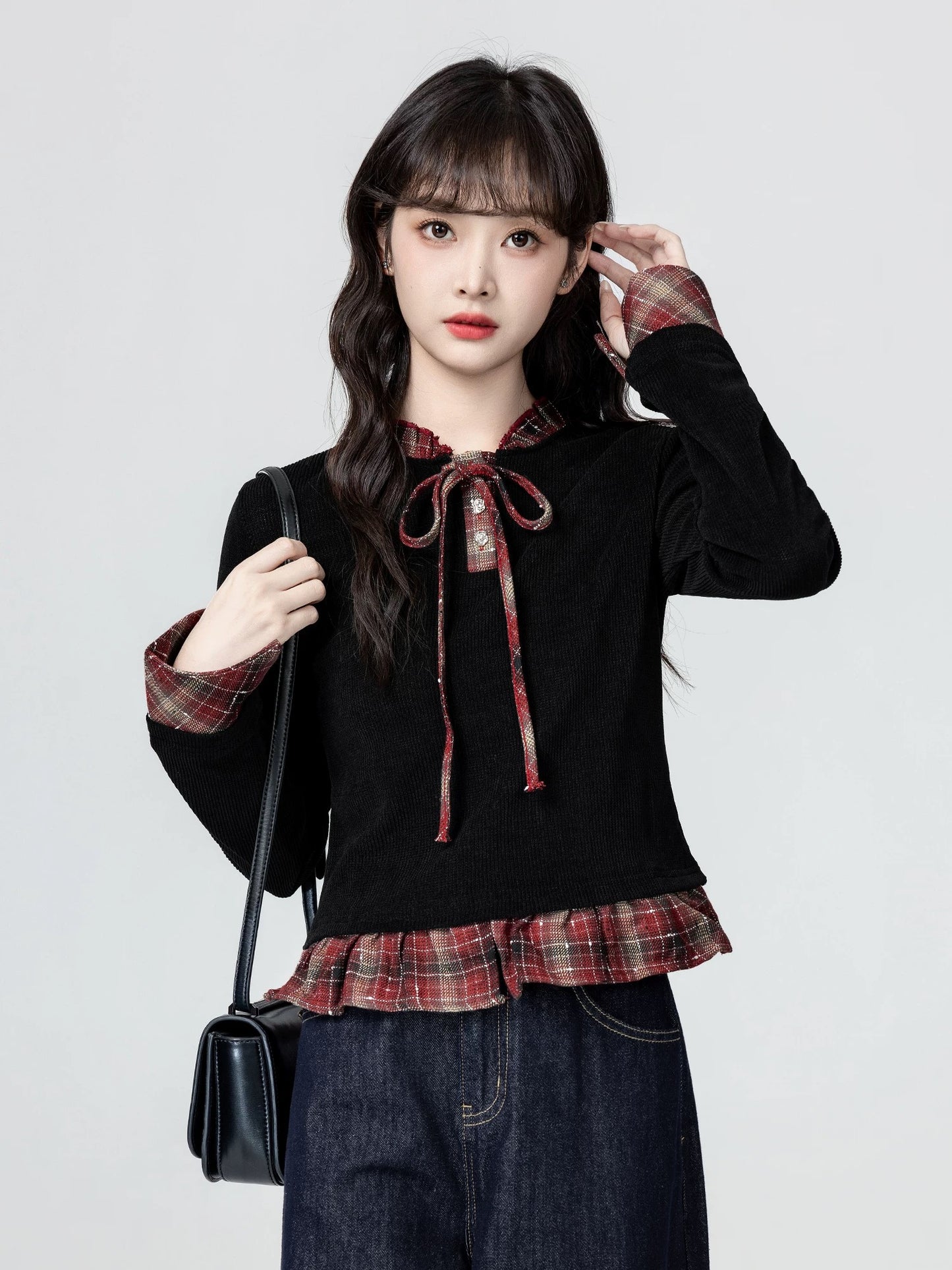 Black fake two-piece long-sleeved T-shirt women's spring and autumn 2025 autumn new plaid splicing straight shoulder slim short top