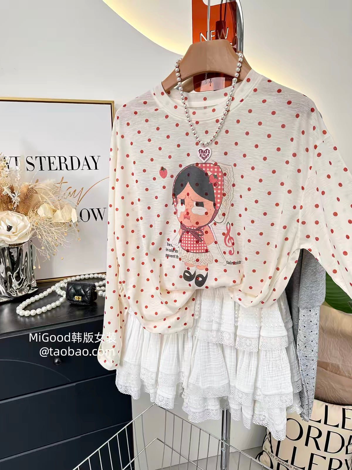 Sweet and adorable sun-protection top—a stylish, trendy, loose-fitting women's summer T-shirt featuring Korean-style polka dots and a cute cartoon print, crafted from lightweight Lyocell fabric.