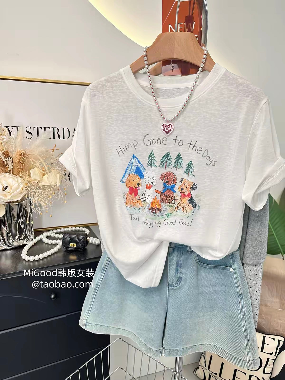 A personal favorite—stylish Korean-style loose-fit T-shirt for women. Features a cute illustrated puppy design and a flattering cut; made from lightweight "snow-wash" cotton.
