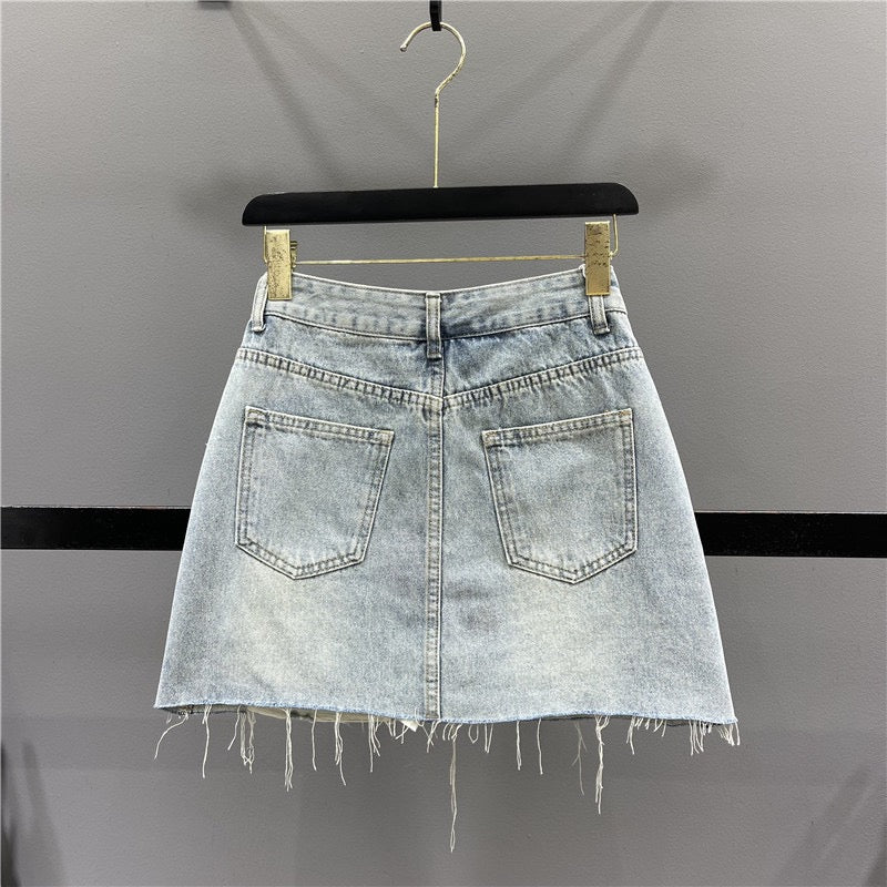 Letter graffiti ripped denim skirt female 2023 summer new high waist thin A word raw edge bag hip skirt