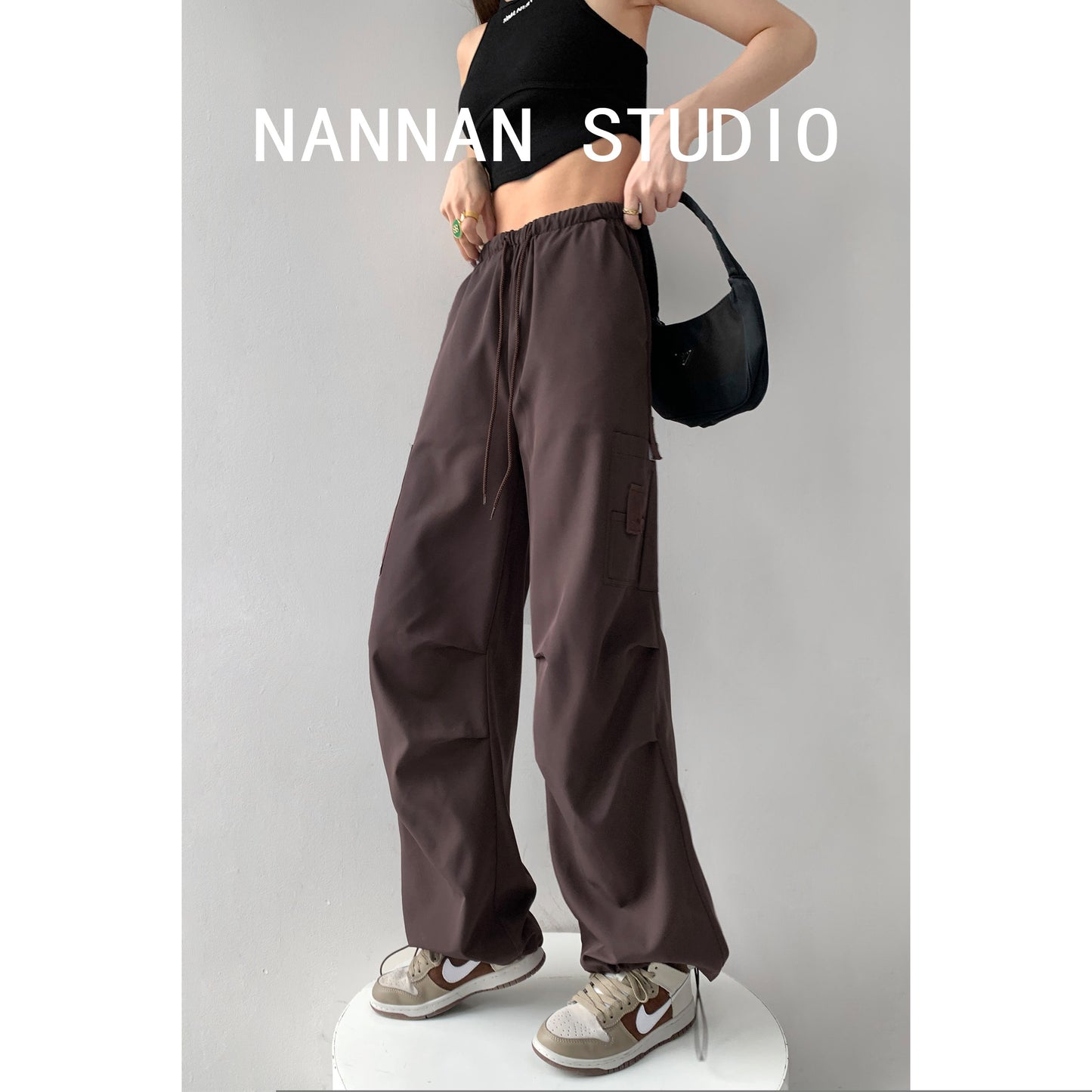 Sweet cool spring and autumn hot girl pink pleated low-waist overalls women's splicing pockets adjustable drawstring sports pants