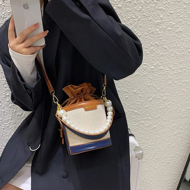 Explosive Western-style high-end small bucket bag women's summer 2022 new all-match niche design single-shoulder messenger bag