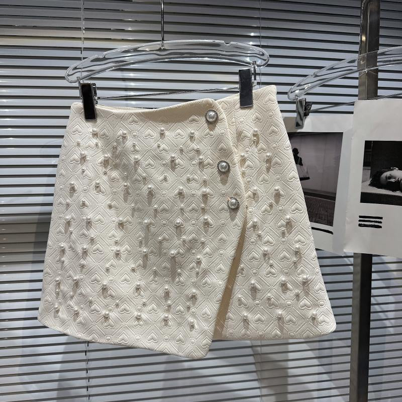 Internet celebrity with the same style 2022 winter new style small fragrance style high-definition pearl beaded short jacket + beveled skirt suit