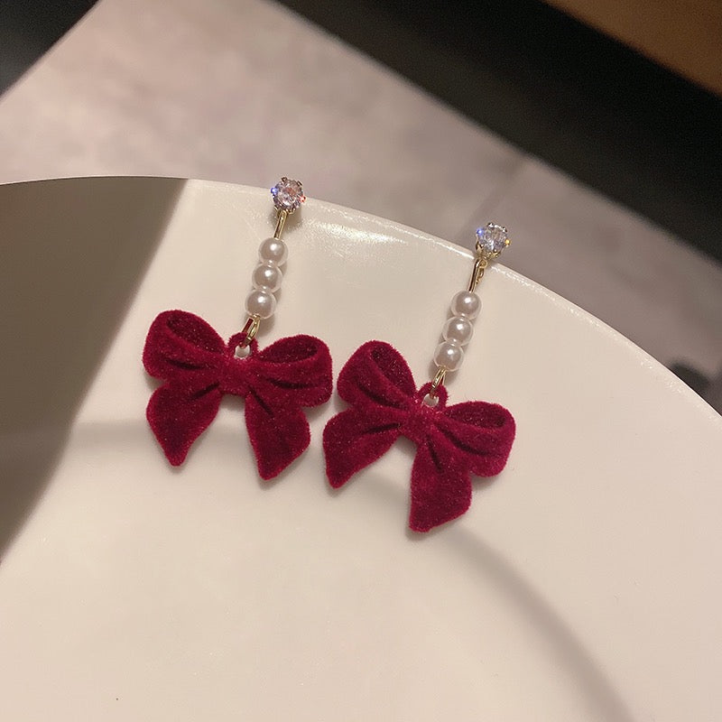Silver needle autumn and winter red velvet earrings female pearl bow earrings niche design high-end versatile earrings